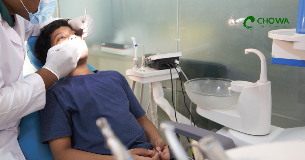 best dental care in Gulshan with dentist examining child patient in a modern dental clinic