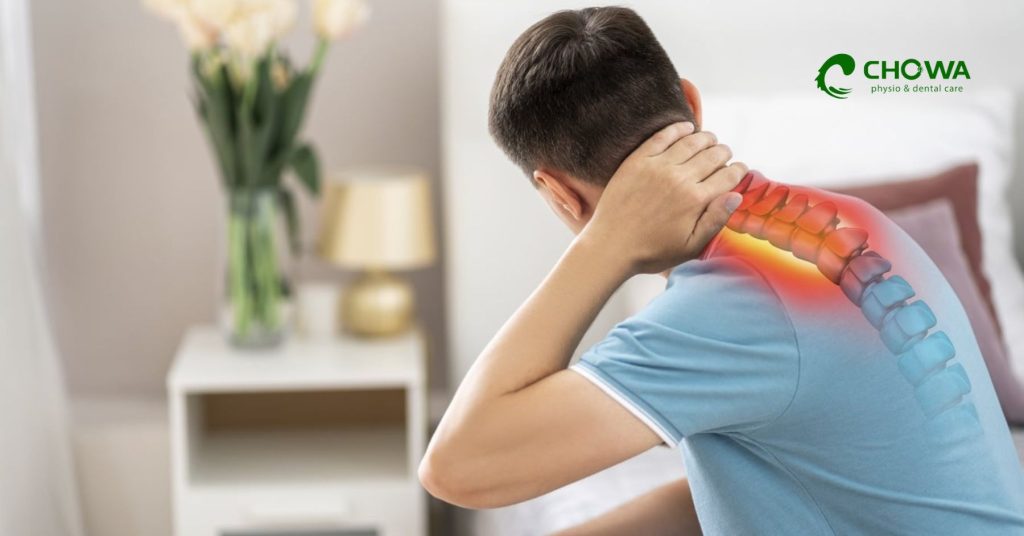 Neck Pain Physiotherapy in Gulshan showing man holding neck with highlighted spine pain area