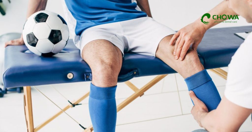 Sports Injury Physiotherapy in Gulshan showing football player knee injury treatment on field