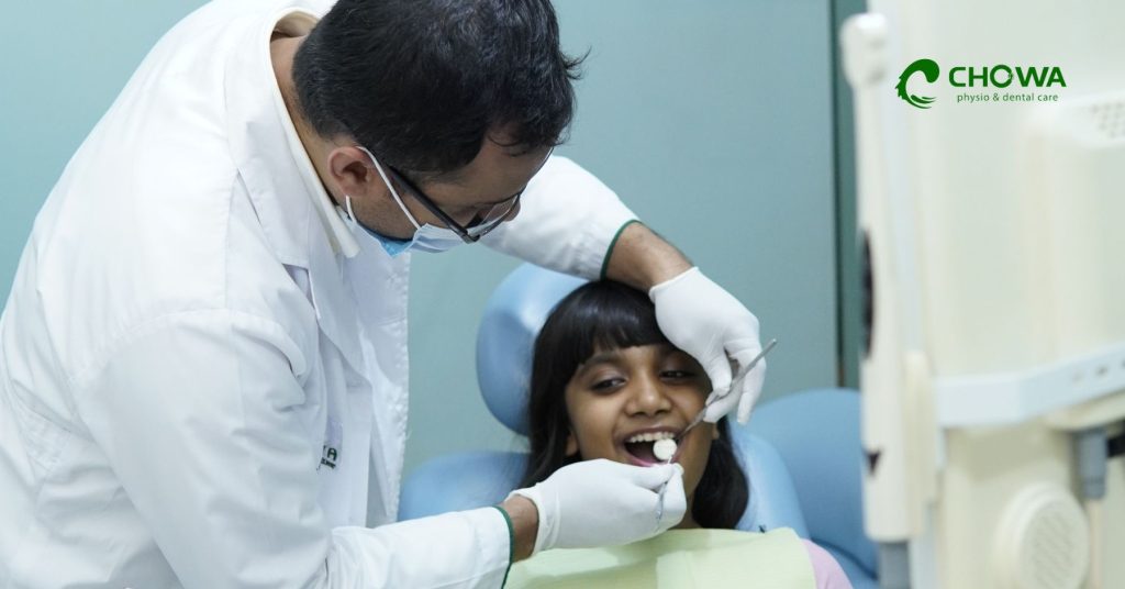 Pain Free Dental Care for Children showing gentle pediatric dentist treating a relaxed child in modern clinic