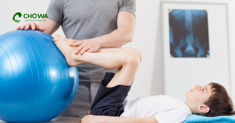 Expert posture training at Chowa physiotherapy clinic in Gulshan using a therapeutic exercise ball.