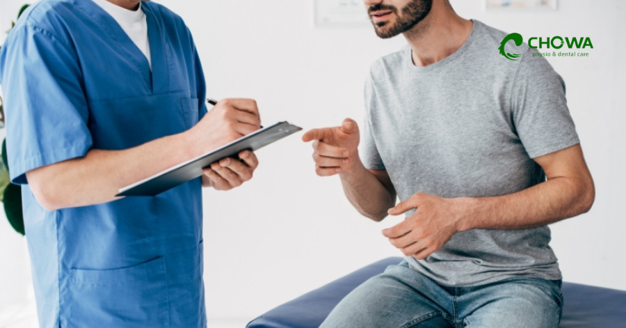 Patient receiving a hip stretch during a physiotherapy appointment in Gulshan at Chowa clinic.