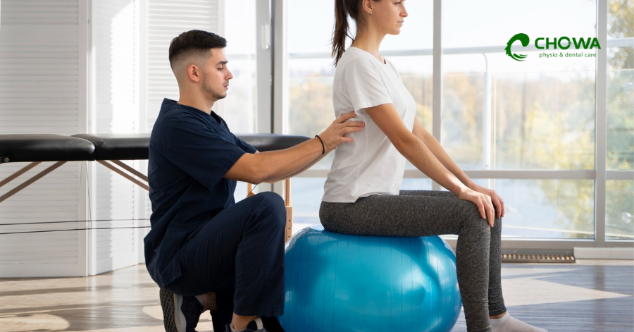 Pediatric leg exercises at Chowa, our physiotherapy clinic in Gulshan, using a blue gym ball.