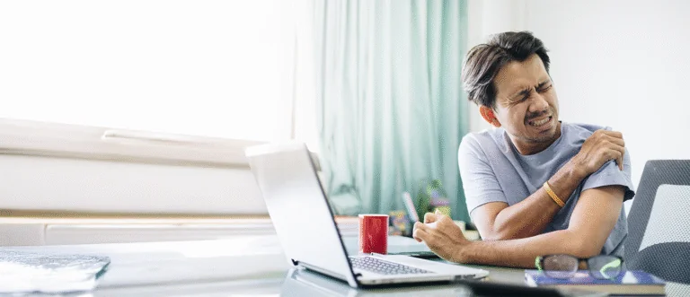 Desk posture causing shoulder pain for ergonomics correction in Gulshan