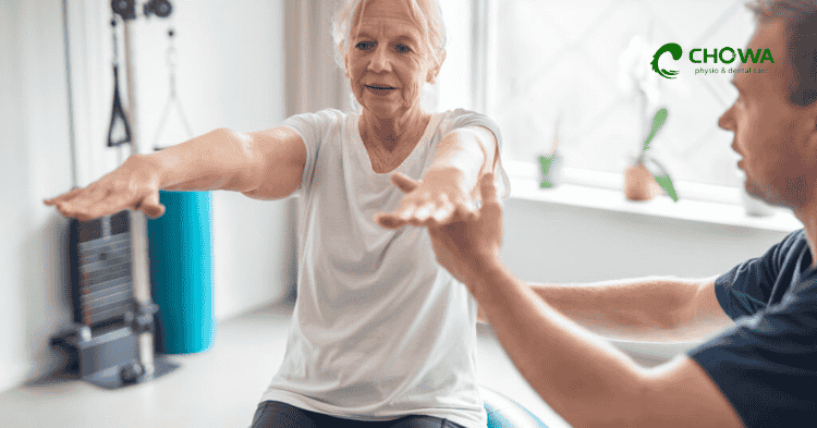 Senior arm exercise guided during geriatric physiotherapy in Gulshan